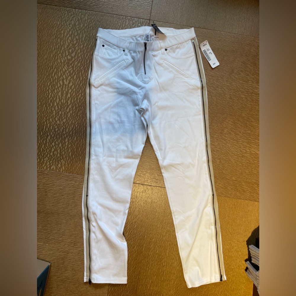 White jeans with zippers on side new with tags